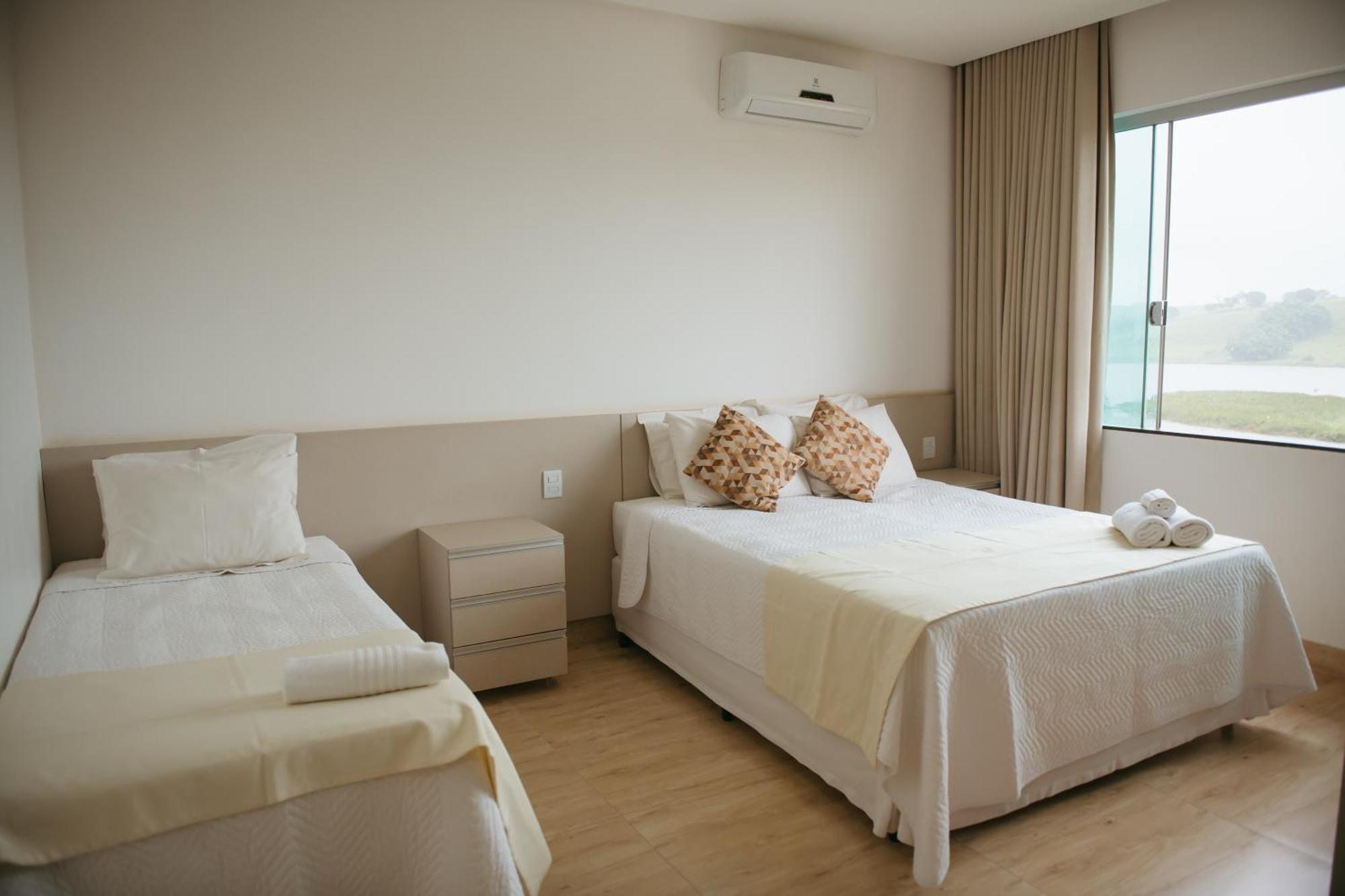 Quarto Triplo Deluxe com Vista