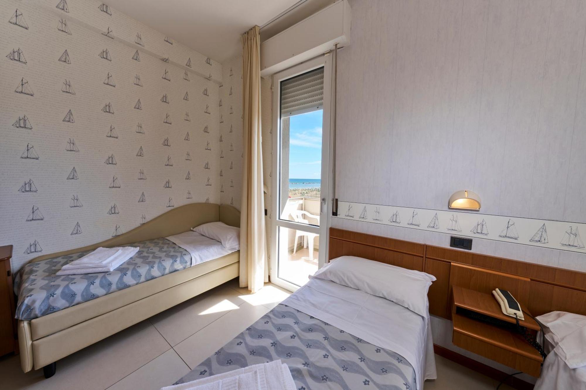 Quadruple Room Sea View Beach Access