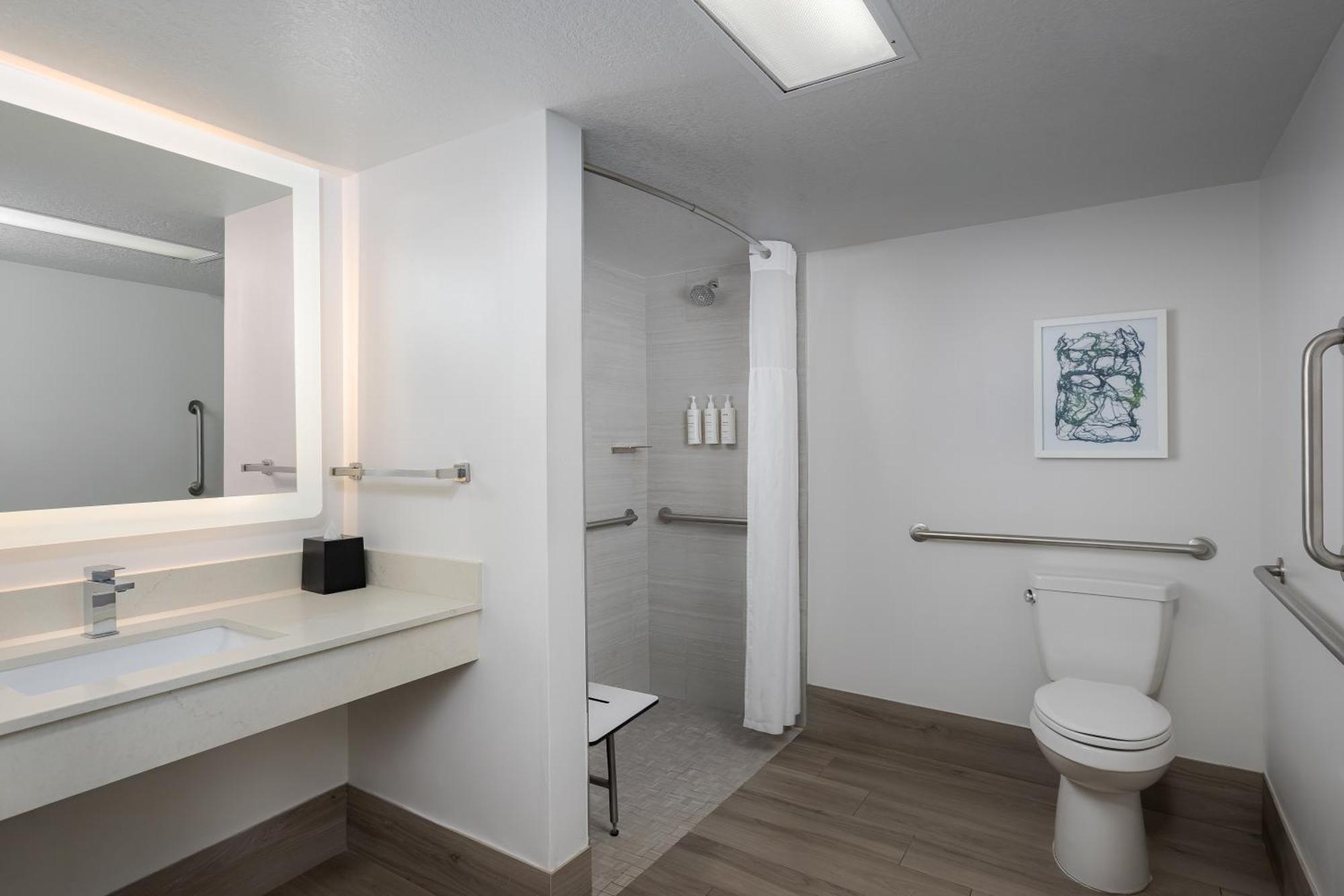 Queen Room Roll Shower Mobility or Hearing Accessible