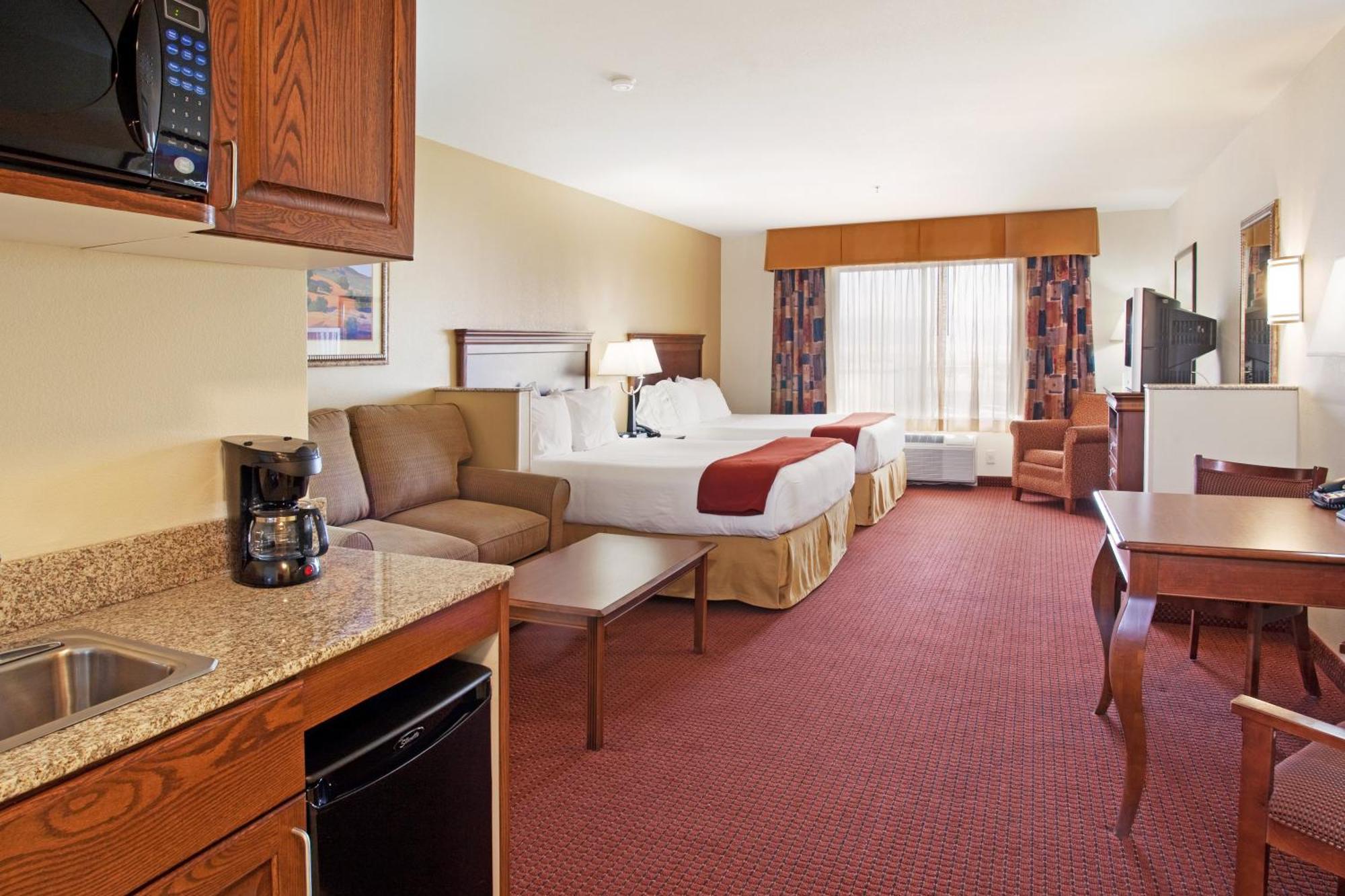 Queen Suite with Two Queen Beds and Sofa Bed
