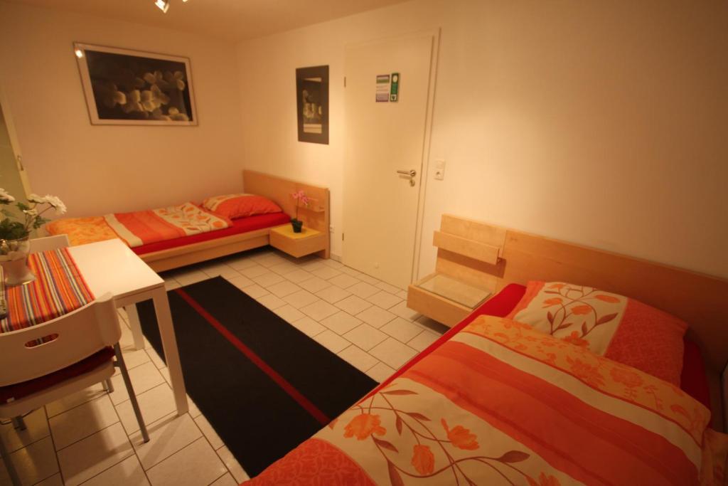 Zweibettzimmer mit Gemeinschaftsbad