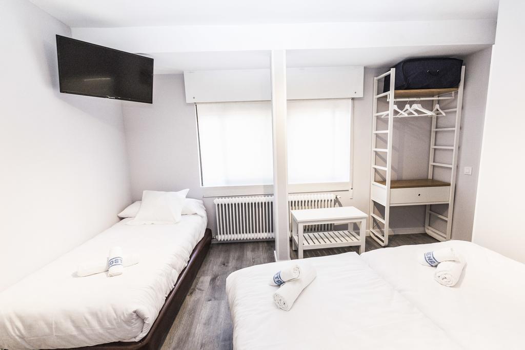 Habitación Doble con cama supletoria y baño privado - 2 camas
