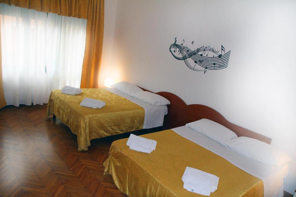Quarto Quádruplo com Casa de Banho Partilhada