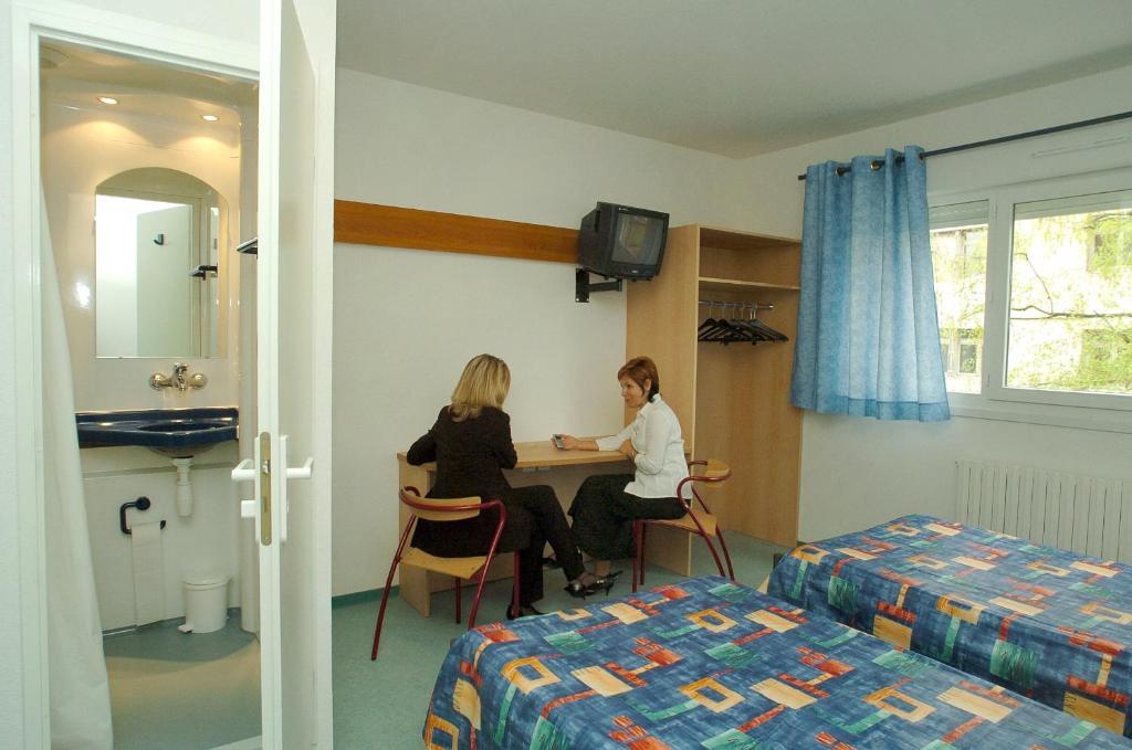 Tweepersoonskamer met 2 Aparte Bedden