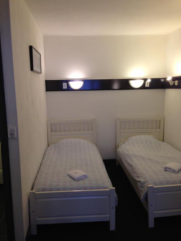 Standaard Tweepersoonskamer met 1 of 2 Bedden met Gedeelde Badkamer