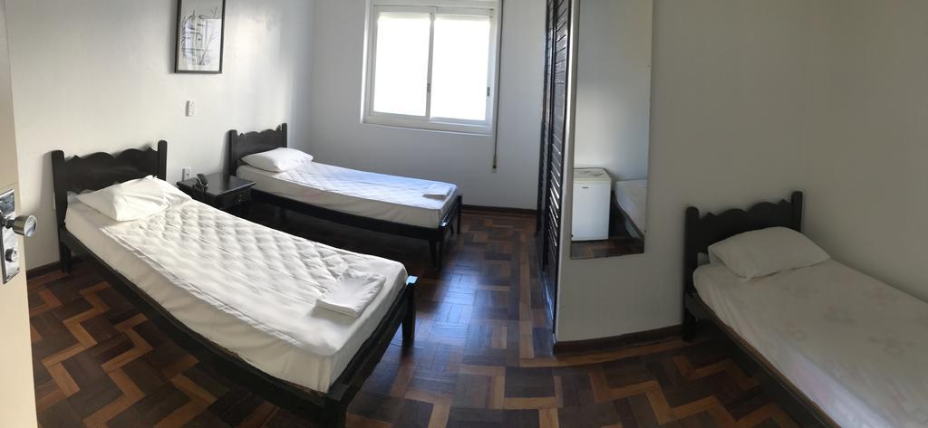 Quarto Triplo com Vista Lateral do Mar