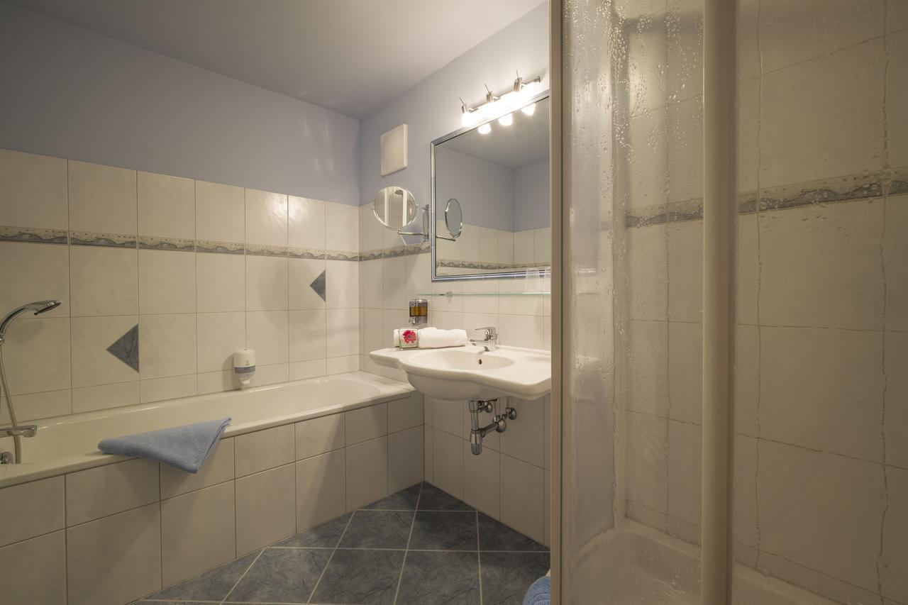 Luxe Kamer met 1 of 2 Bedden en Balkon