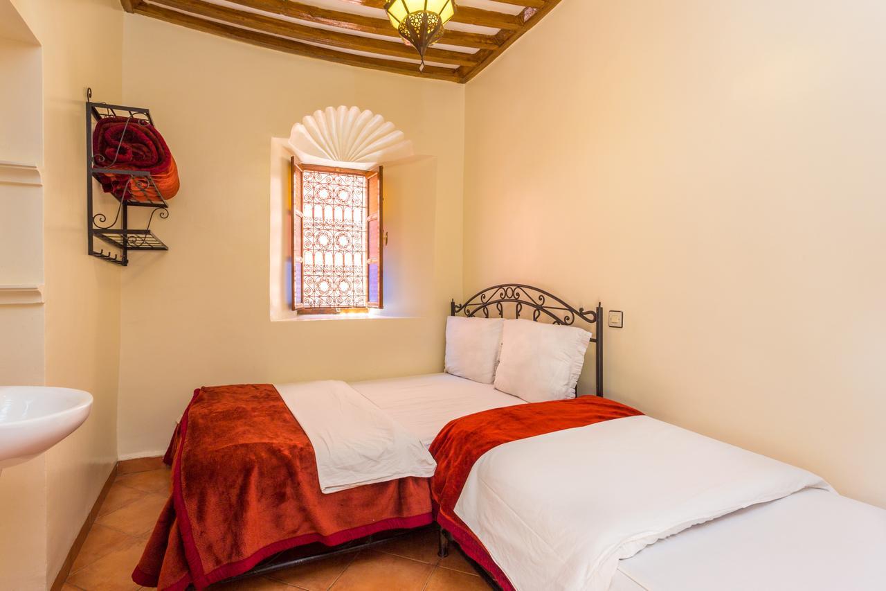 Habitación Triple Económica con baño compartido
