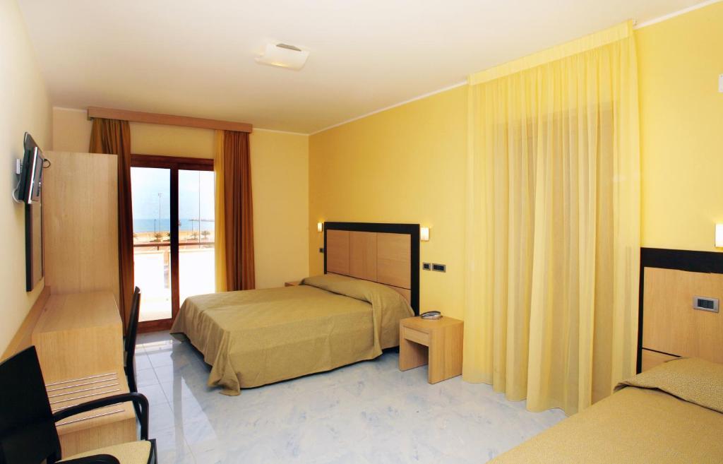 Dreibettzimmer mit Balkon
