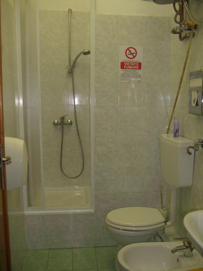 Camera Singola con Bagno Privato Esterno