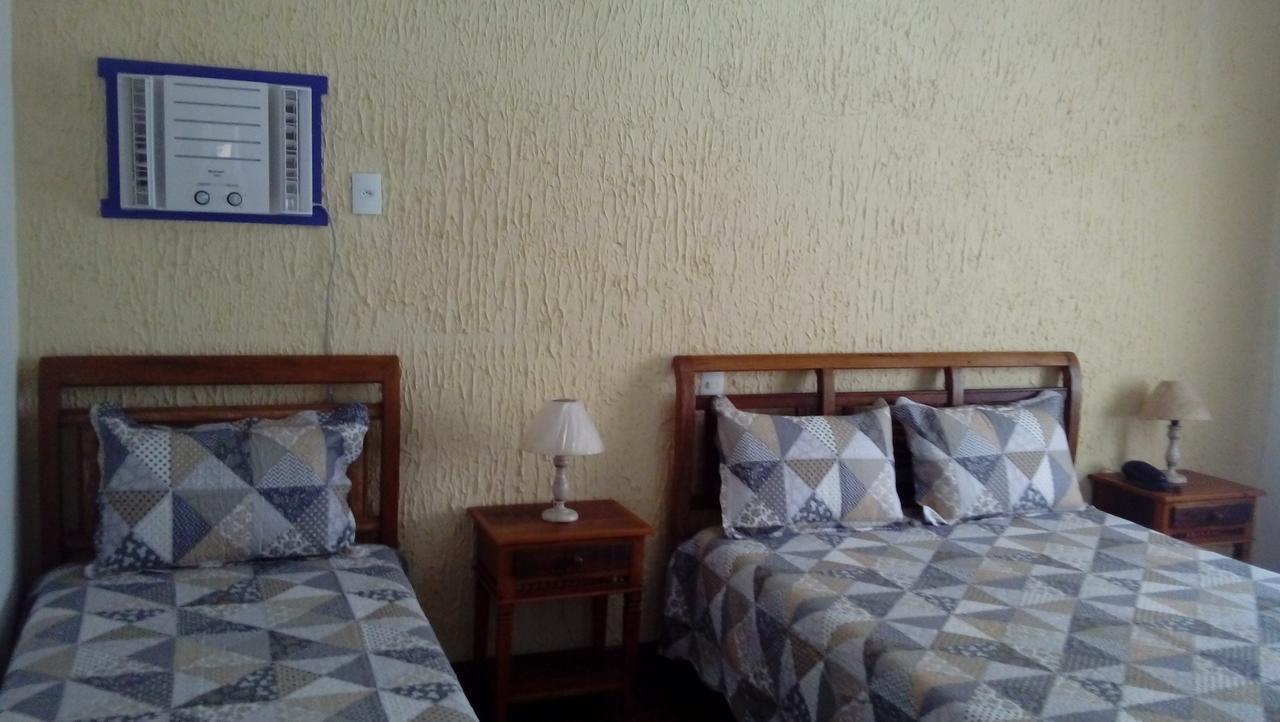 Quarto Triplo com Ar Condicionado