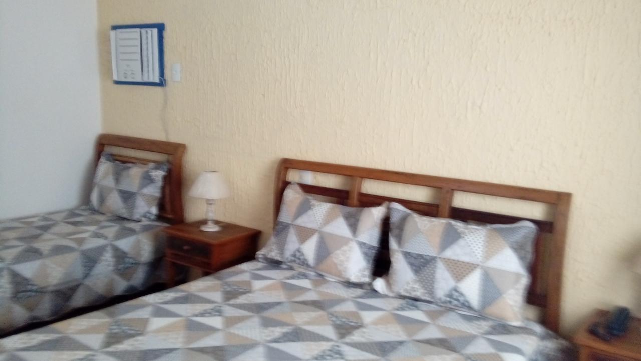 Quarto Triplo com Ar Condicionado