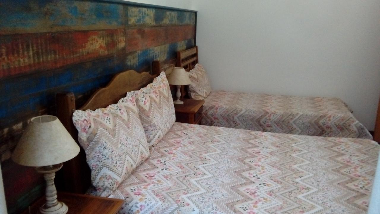 Quarto Triplo com Ar Condicionado