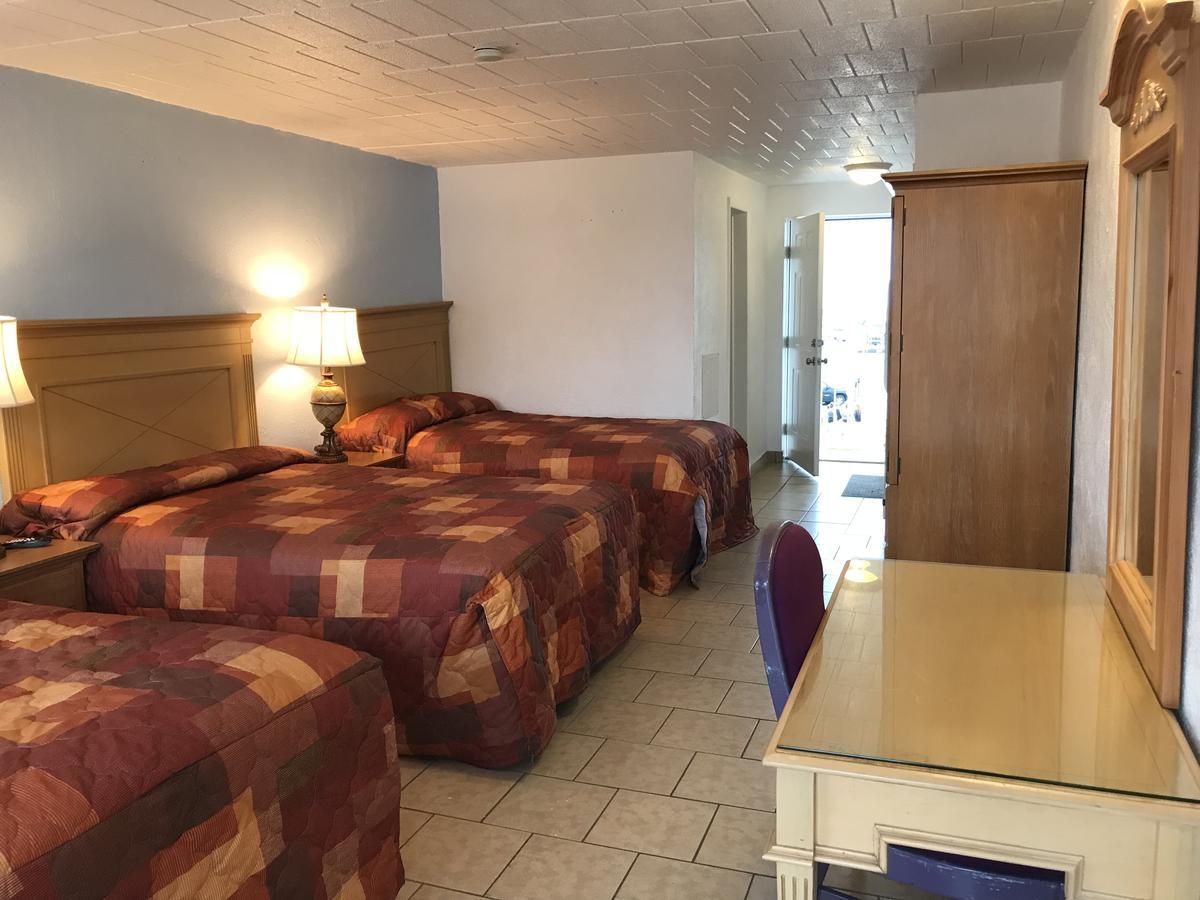 Three Double Beds Balcony or Kitchette