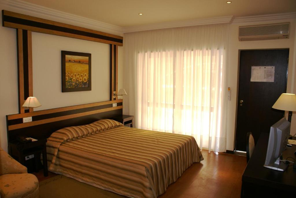 Quarto Duplo com Cama Extra (3 Adultos)