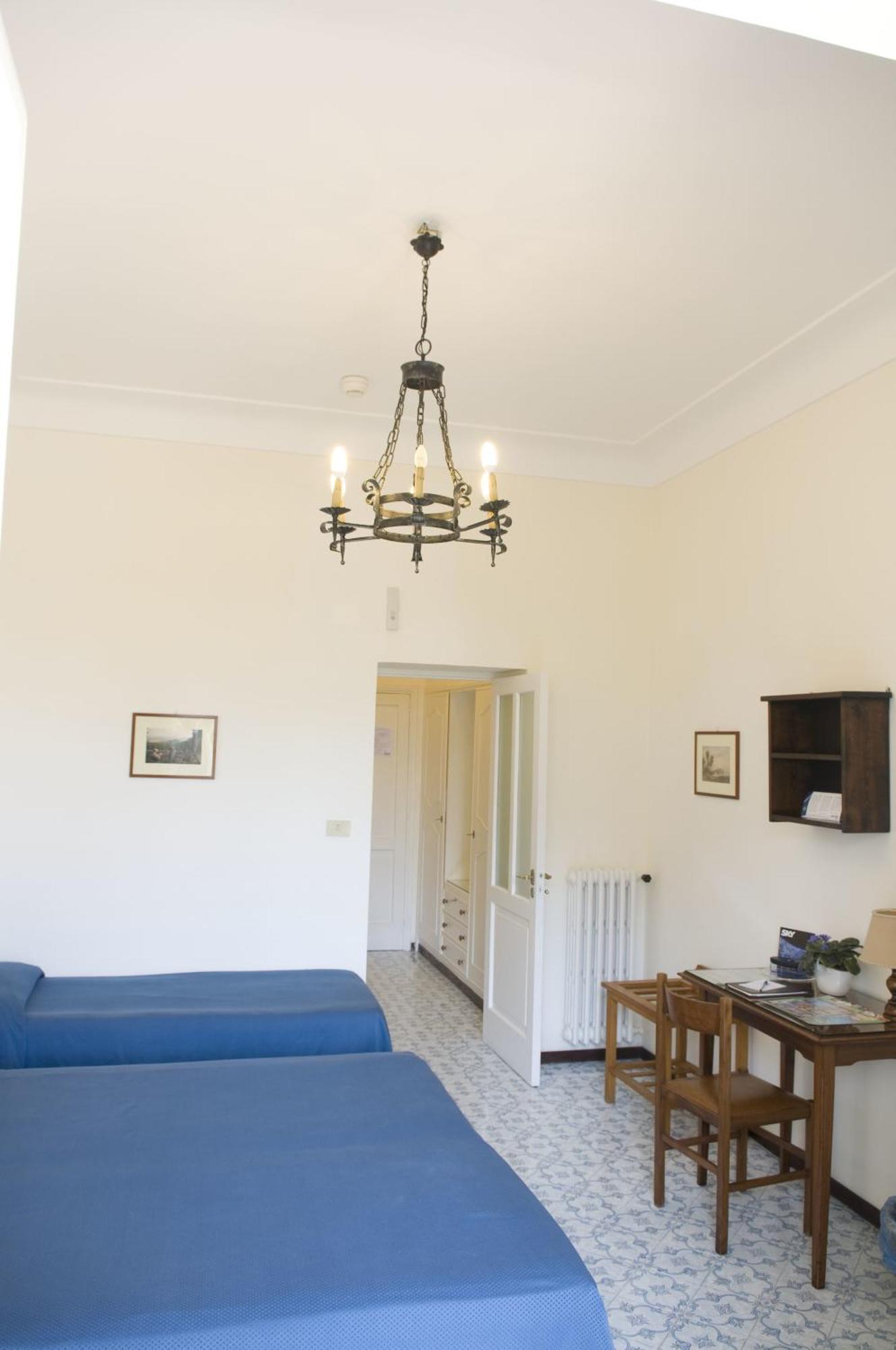 Superior Dreibettzimmer mit einem Balkon und Gartenblick