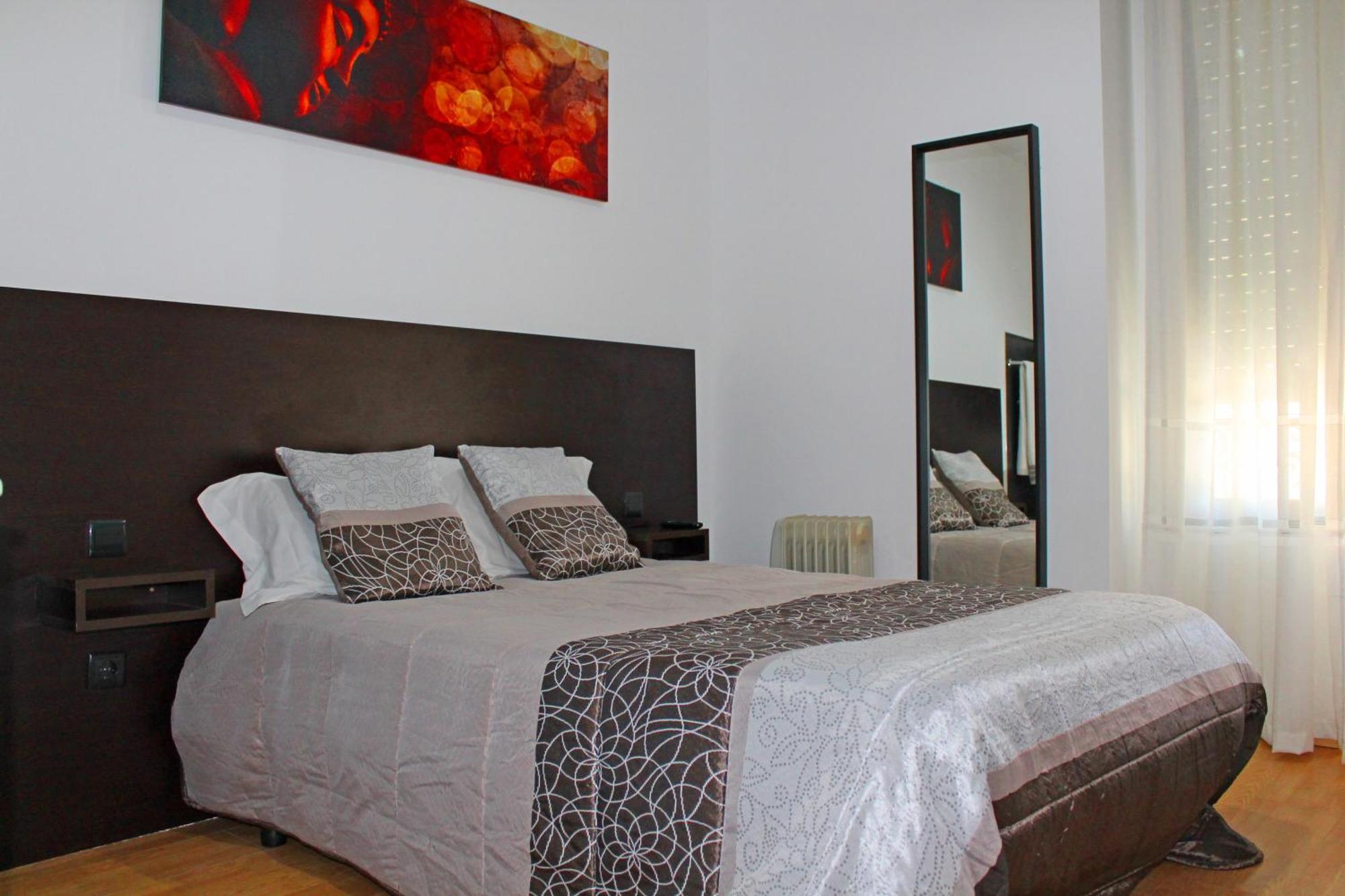 Tweepersoonskamer met Gedeelde Badkamer