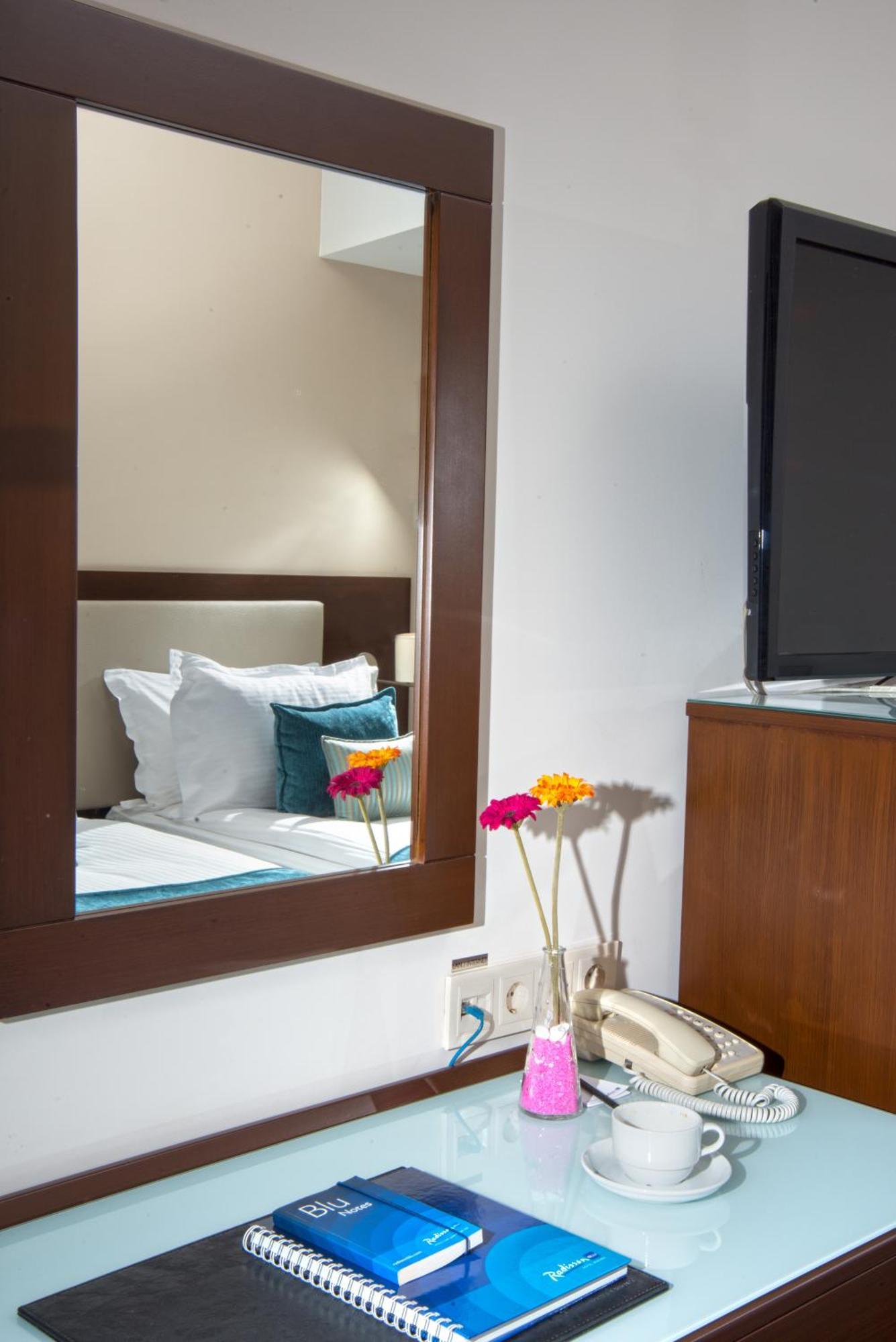 Superior Room with Balcony and City View