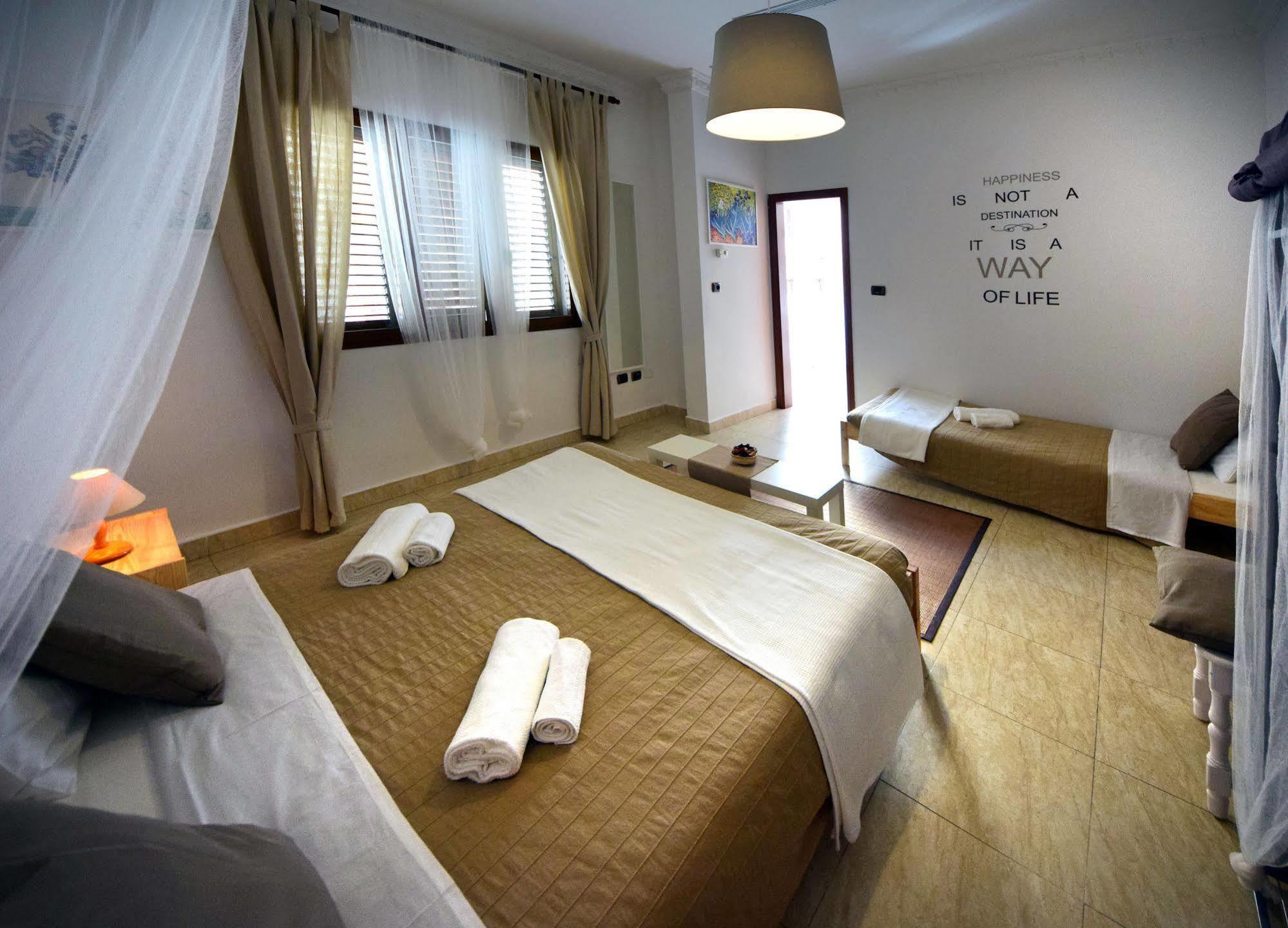 Camera Tripla con Bagno in Comune