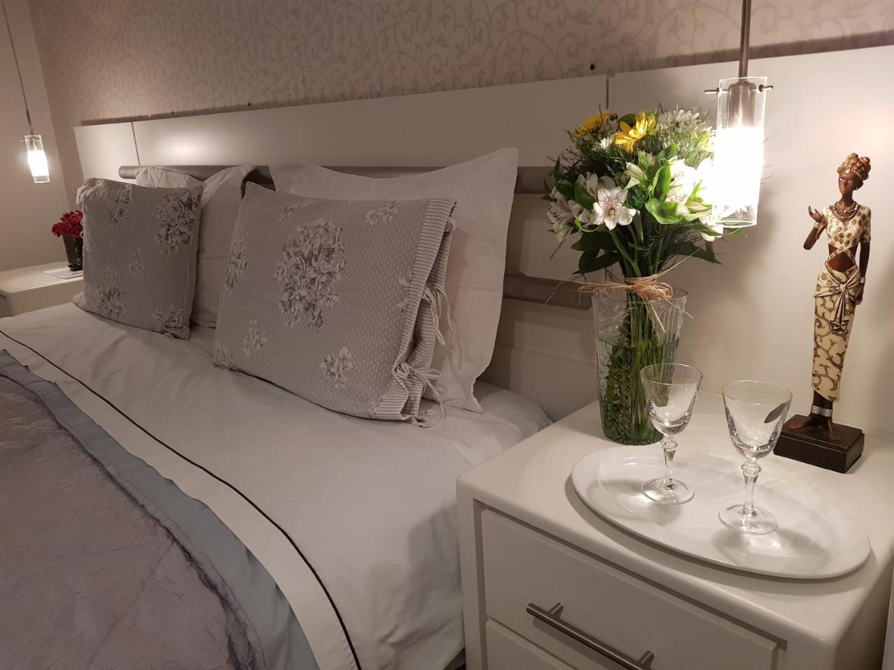 Quarto Quádruplo Premium