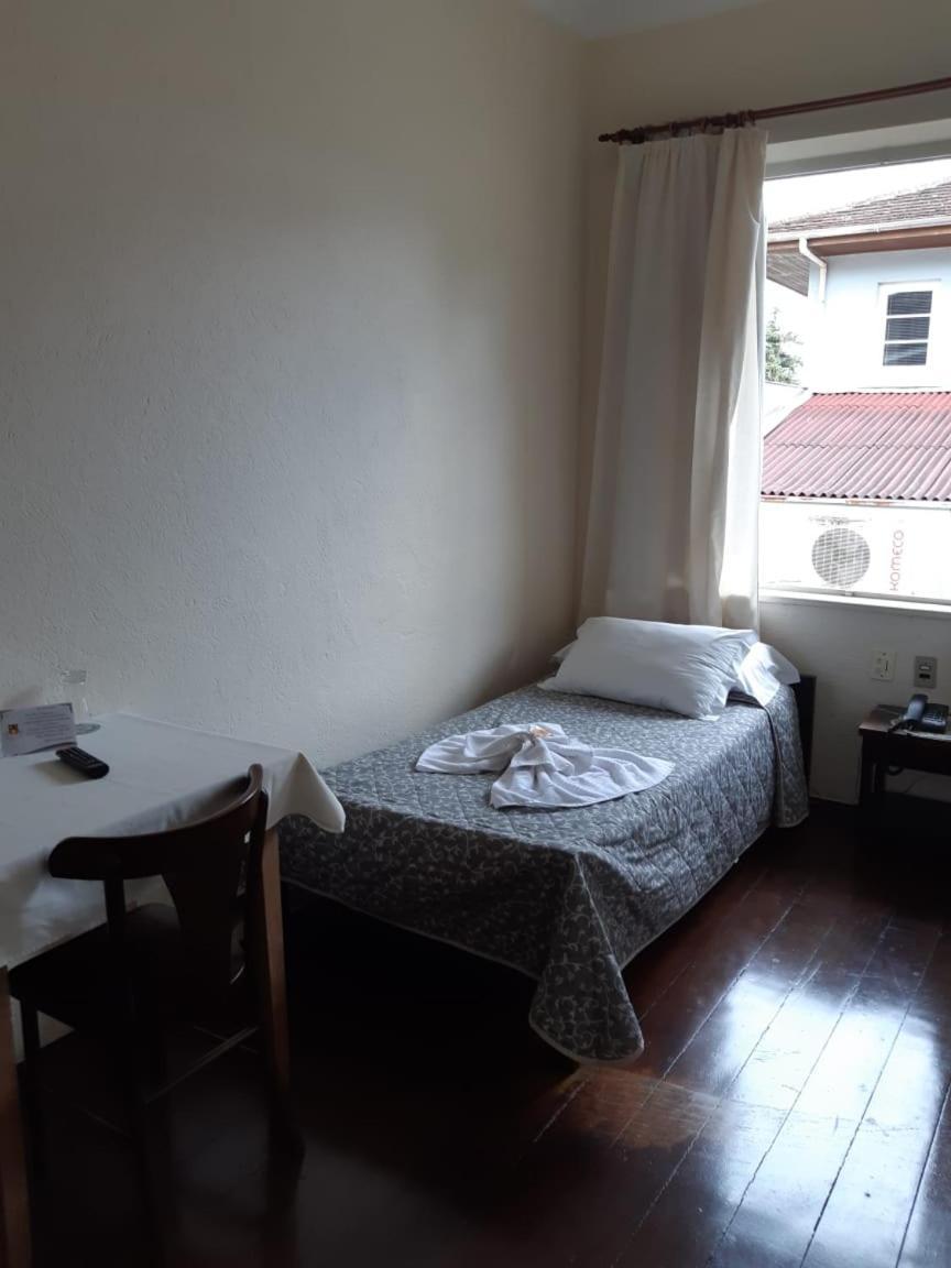 Quarto Individual Econômico