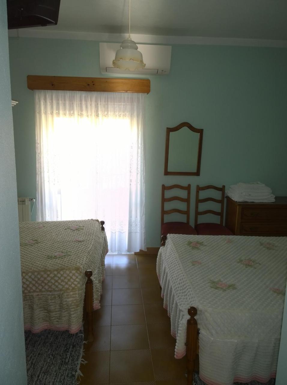 Quarto Quádruplo com Varanda