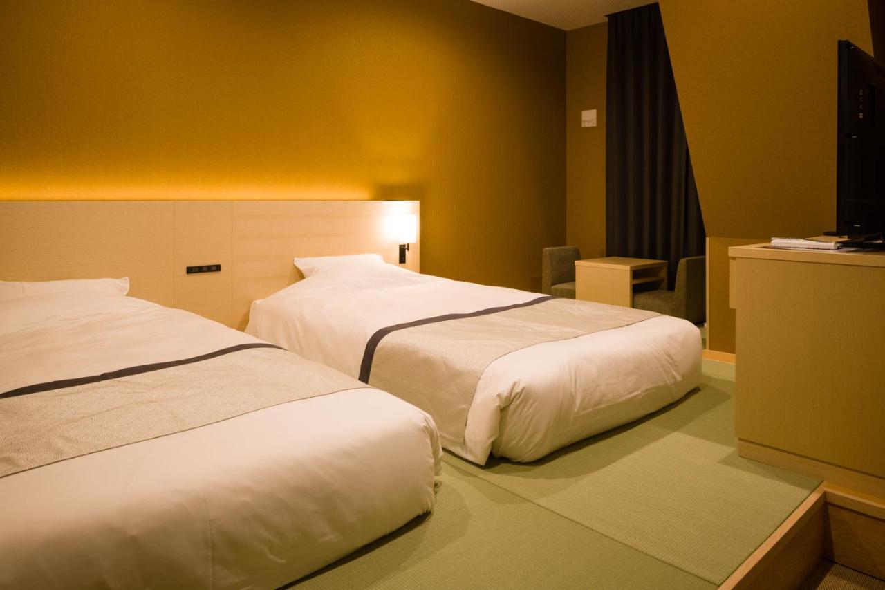 Habitación Doble de 19 metros cuadrados con zona de tatami - 2 camas - No fumadores