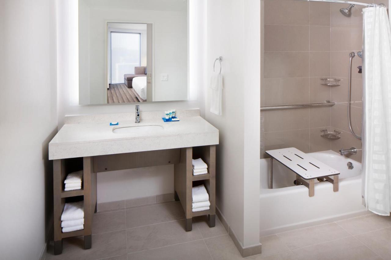 One-Bedroom King Suite Sofa Bed Kitchen Tub Disability Access