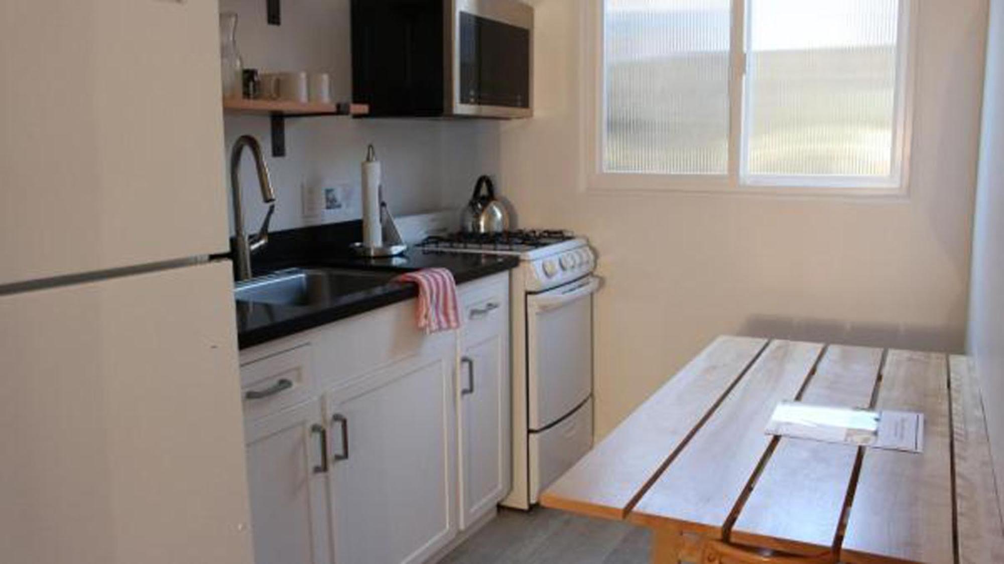 Double Queen Room Pool View Kitchen