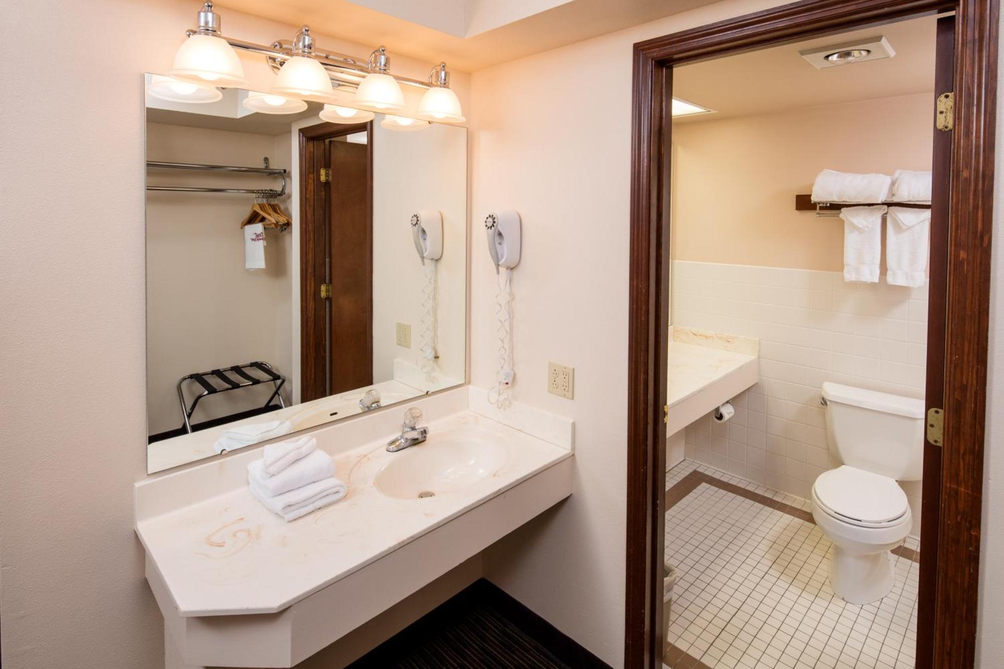 Premier Room Two Queen Beds Court Side 1