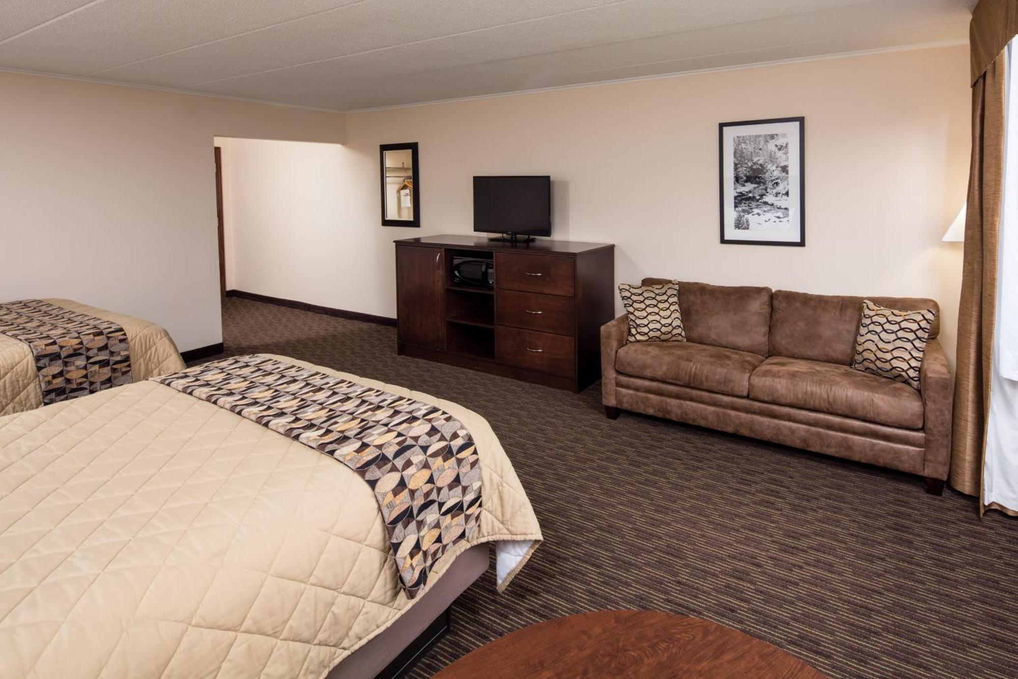 Premier Room Two Queen Beds Court Side 1