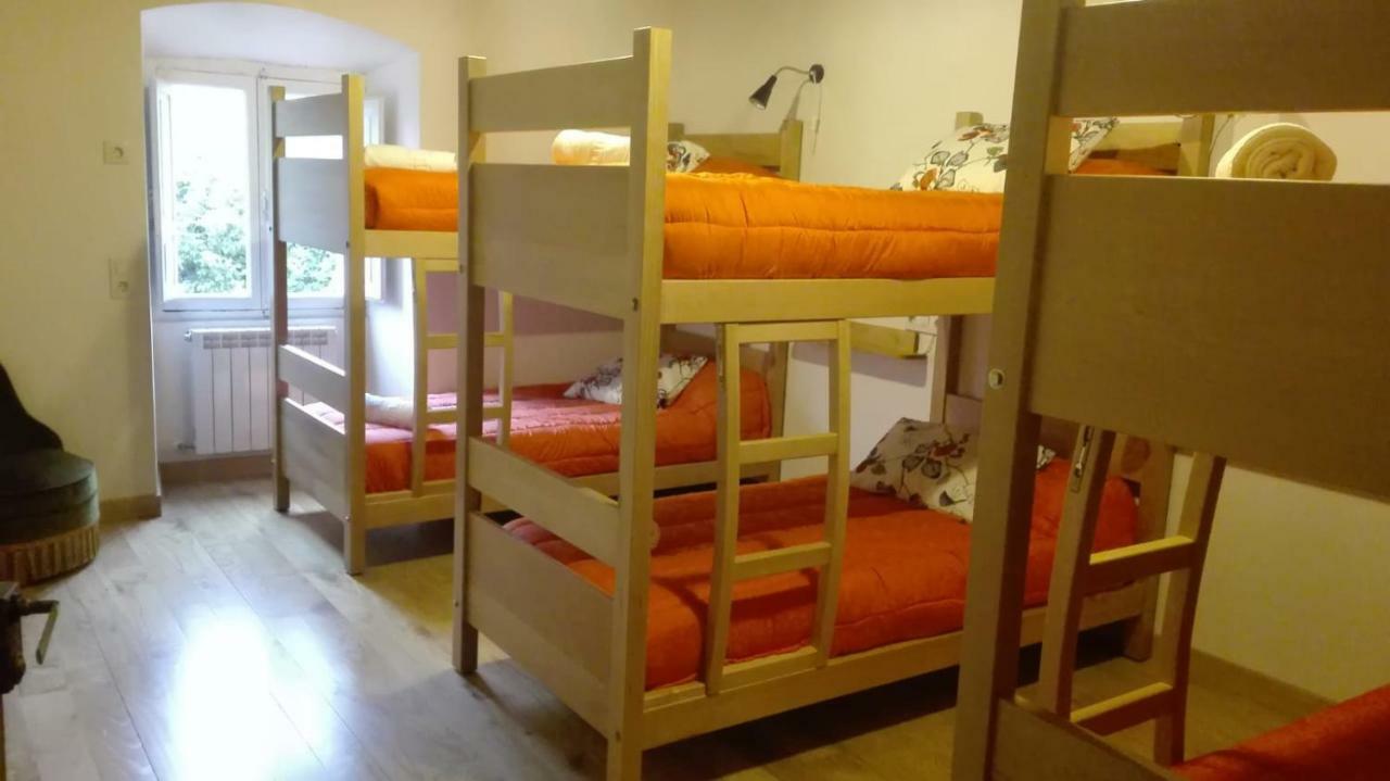Cama en habitación compartida mixta de 6 camas