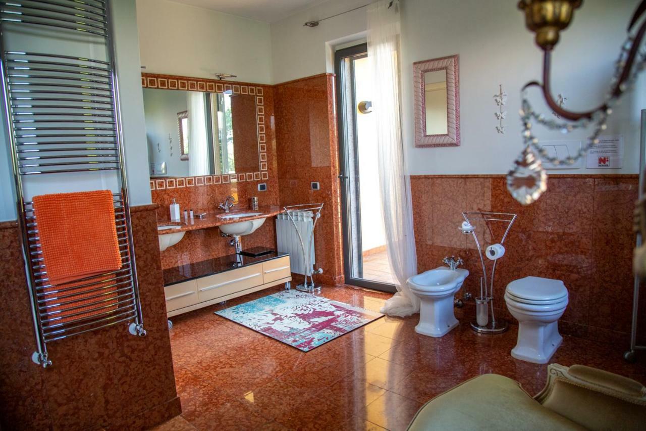 Suite con vasca doccia e balcone