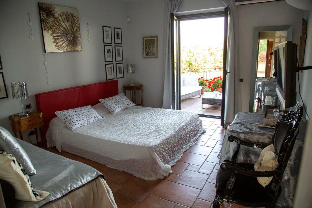 Suite con vasca doccia e balcone