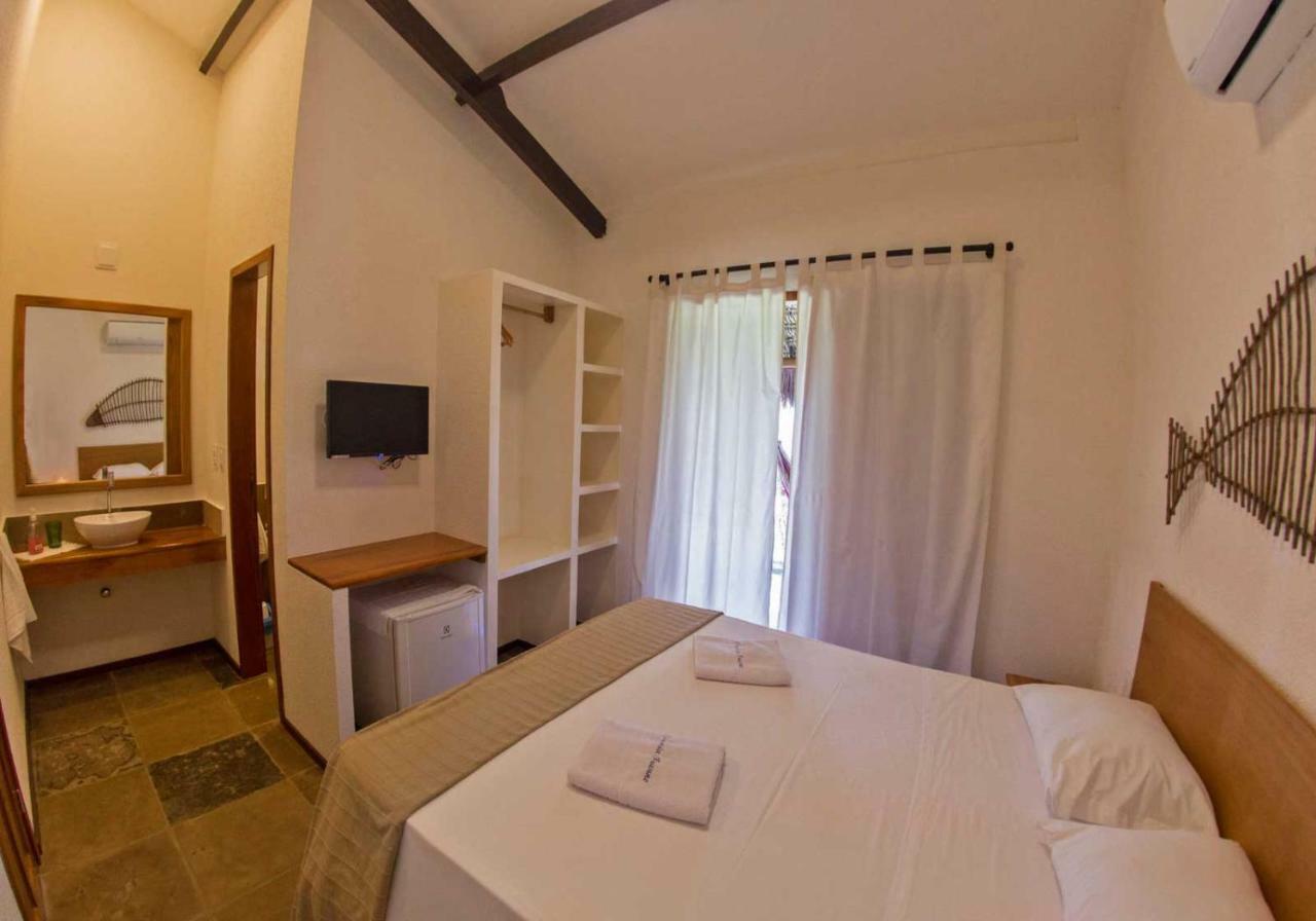 Quarto Deluxe com Cama de Casal ou 2 de Solteiro e Varanda