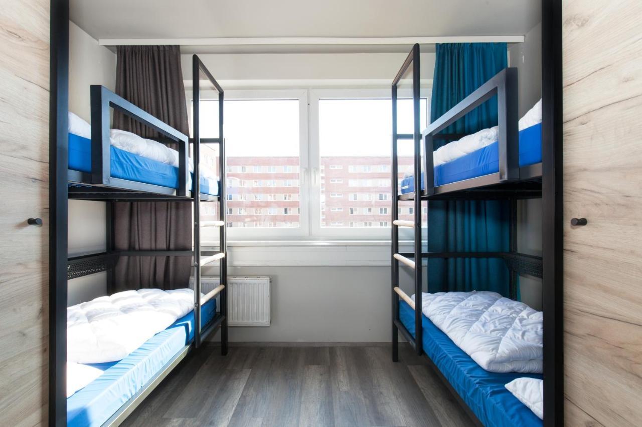 Posto Letto in Dormitorio con 4 Letti