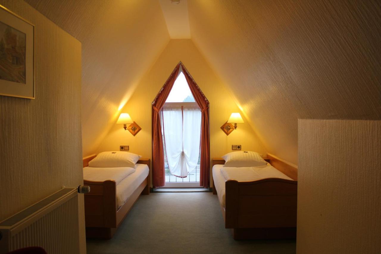 Doppel- oder Zweibettzimmer