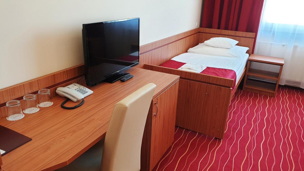 Quarto Triplo Standard com 3 Camas Individuais