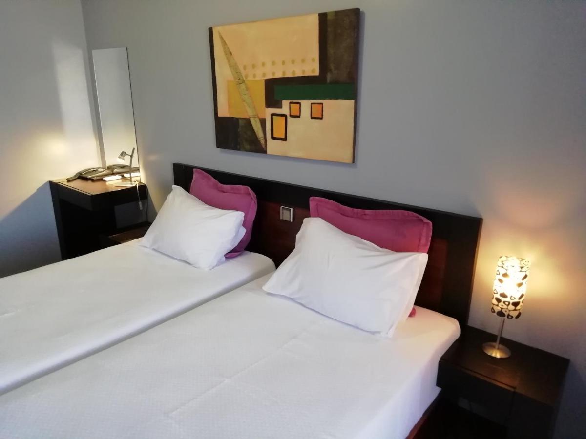 Quarto Individual com Varanda