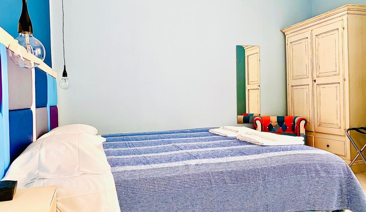 Tweepersoonskamer met 1 of 2 Bedden en Eigen Externe Badkamer
