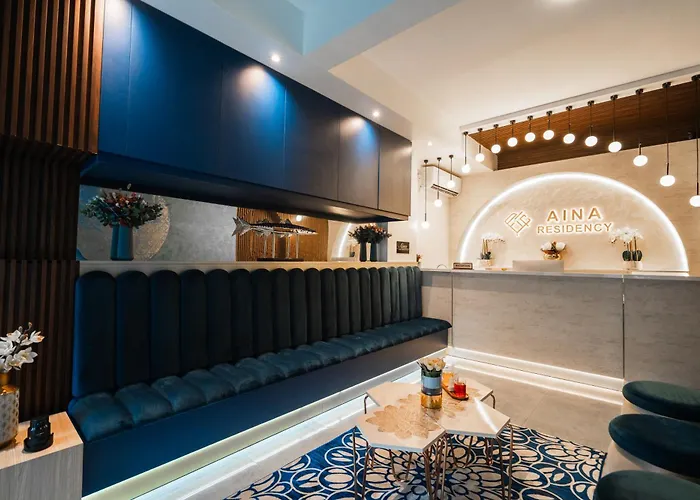 Aina Residency Beachfront Hotel