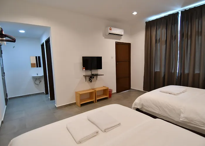 Capital O 90615 The Bed Hotel