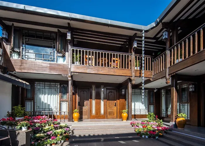 Golden Dragon'S Mountain Glow Inn Chinese Style Courtyard Of Lijiang Ancient Town Close To Main Streets Near By Dashiqiao Sifang Street,Big Water Wheels,We Offer Tickets Purchasing Services,Free Station Pick-Up For Three Nights Of,Provide Nutritious