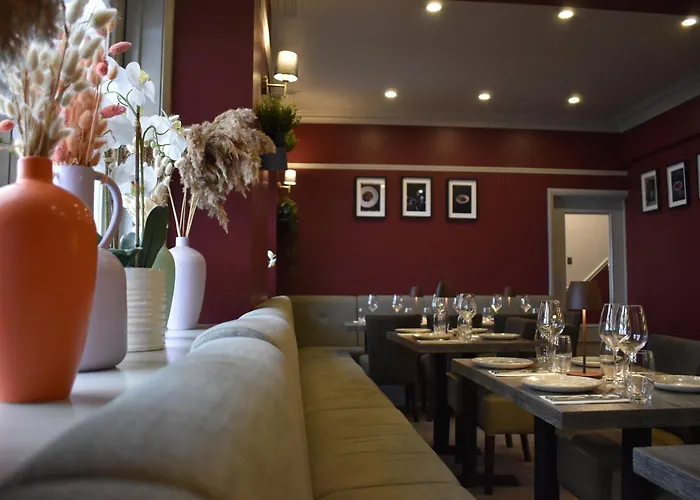 Nomi Rooms & Restaurant