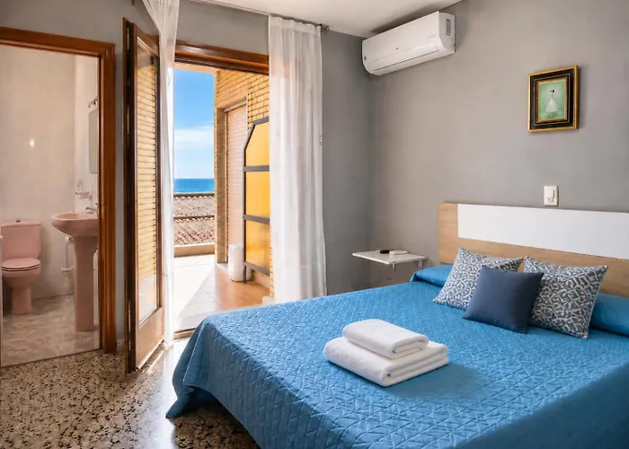 Vacansis Habitaciones de Hostal a Primera linea de playa en Cullera