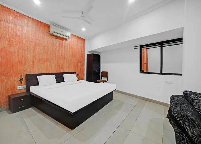 Capital O Convivial Hotel Amit Regency