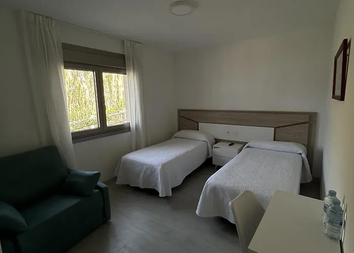 Habitaciones A Postiña
