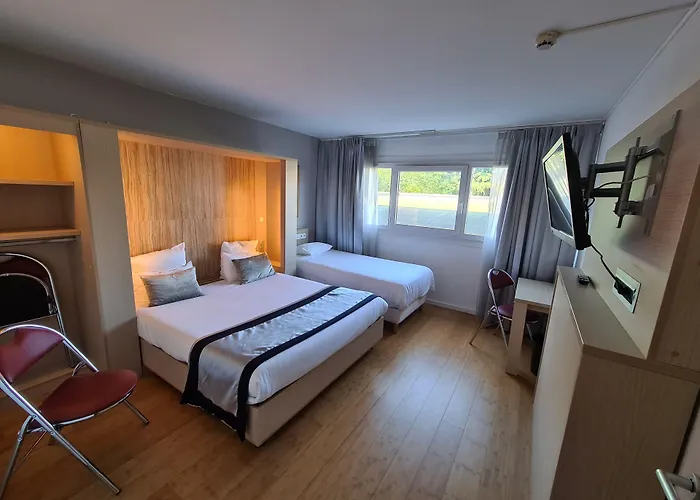 HÔTEL C SUITES chambres spacieuses Nîmes
